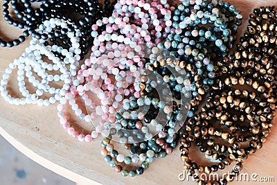 Close up of gemstone bracelets in the street market. Stock Photo