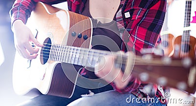 Close-up girl holding guitar. Stock Photo