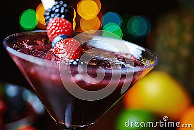 Close up glass of tropical cocktail with berries or lemonade. Stock Photo