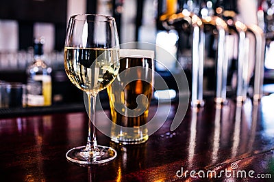 Close up of a glass of wine and a beer Stock Photo