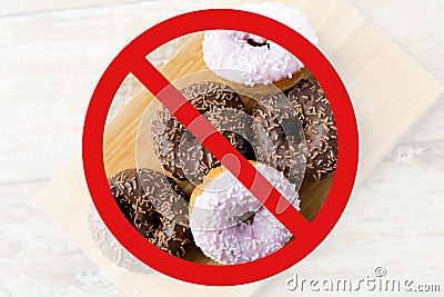 Close up of glazed donuts pile behind no symbol Stock Photo