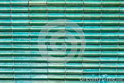 Close up glossy turquoise green tile color structure layer block Stock Photo