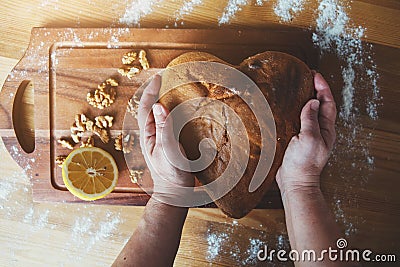 Close up of grandma`s hands cooking homemade cake Stock Photo