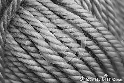 Close up of gray rope like texture of synthethic fibre ball of wool Stock Photo