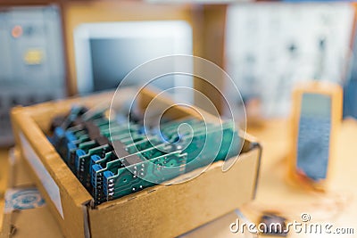 Close-up electric green embedded microcircuits in production Stock Photo
