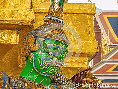 Close up Green Giant Lift golden Pagoda in Wat Phrakaew temple Bangkok Thailand Stock Photo