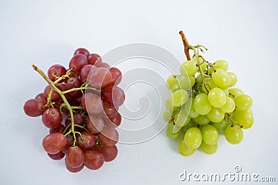 Close-up of green and red bunches of grapes Stock Photo