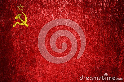 Close-up of the grunge flag of the Soviet Union. Dirty USSR flag on a metal surface Stock Photo