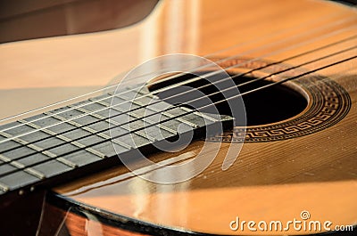 Close-up of guitar strings in sunlight Stock Photo