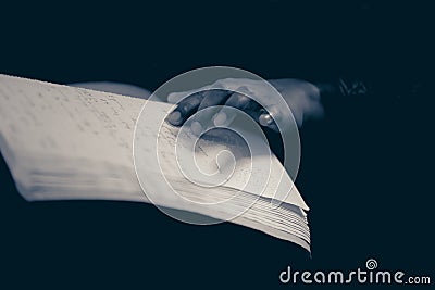 A hand of a blind person reading a braille system book Editorial Stock Photo