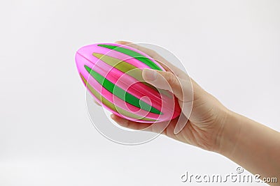 Close up hand holding Rugbyball on white background Stock Photo