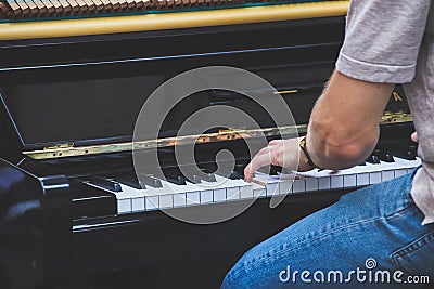 Close up hand Musician playing piano on outdoor. Stock Photo