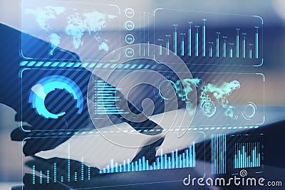 Close up of hand using tablet on desktop with creative glowing blue business chart and map hologram on blurry background. Stock Photo