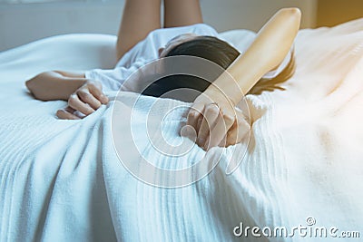 Close up of hand woman sign orgasm, Finger female pulling white bedsheet Stock Photo