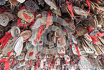 Close up of hand written prayers hanging on a roof. Editorial Stock Photo