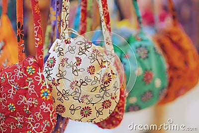 Close up of Handicrafts embroidered bag with traditional pattern texture background Stock Photo