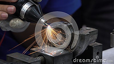 Close up handle grinding machine for polishing metal of automotive parts Stock Photo