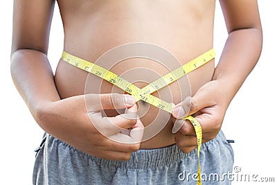 Close up hands boy measuring tape on abdominal surface Stock Photo