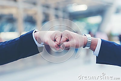 Close up hands businessman and partner working of business people join hand together and start up work. Stock Photo