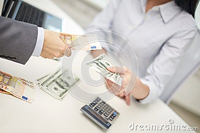 Close up of hands giving or exchanging money Stock Photo