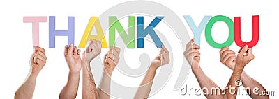 Close-up Of Hands Holding The Word Thank You Stock Photo