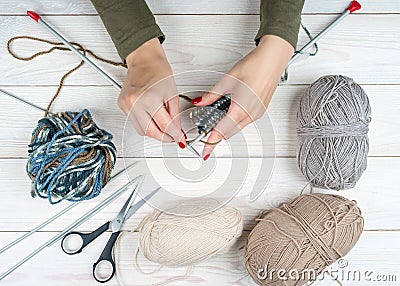 Close-up of hands knitting. Colorful threads. Selection of colorful yarn wool. Knitting background. Knitting yarn for Stock Photo