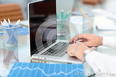 Close up hands multitasking man using laptop connecting wifi Stock Photo