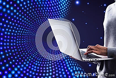 Close up of hands using laptop computer on creative big data flow background. Technology, cyberspace, science and digital stream Stock Photo