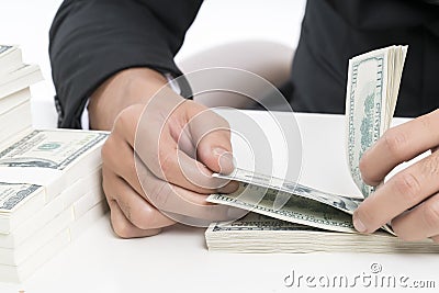 Close up hands of the young bank employee is counting banknotes Stock Photo