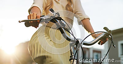 Close up hands of a young girl on vintage bicycle in park. Stock Photo