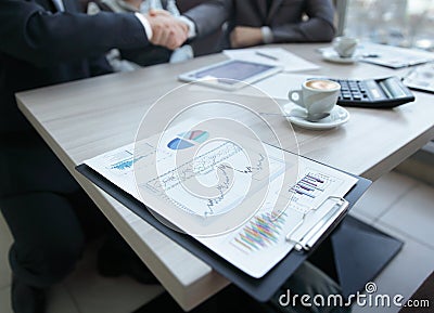 Close up.handshake financial partners at the table of negotiations Stock Photo