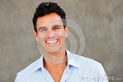 Close up handsome casual businessman smiling Stock Photo