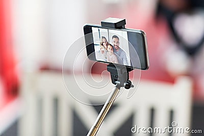 Close up of happy family selfie on smartphone Stock Photo