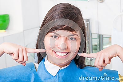 Close-up of happy patient in dentistry office smiling Stock Photo