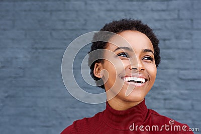 Close up happy young black woman laughing Stock Photo