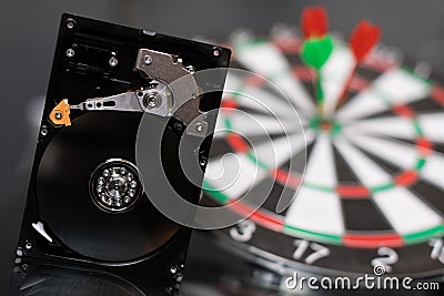 Winchester on background of Darts hit center of target Stock Photo