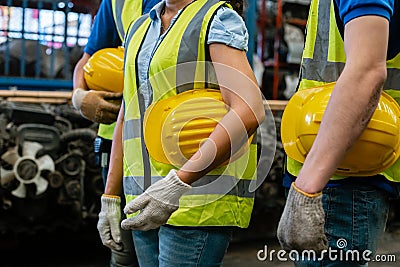 Close up hardhats or helmets of team engineering, worker standing at industrial. Stock Photo