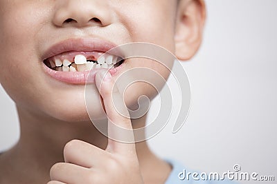 Close up headshot cropped image little preschool cute boy widely smilin showing empty space Stock Photo