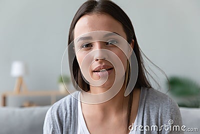 Headshot of millennial girl talking on video call Stock Photo