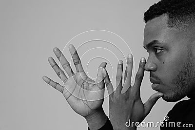Close-up headshot of young Black man with mental issues. Mental health. Stock Photo