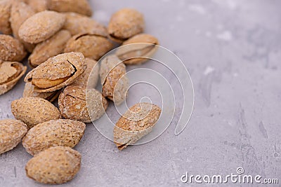 Close-up heap almonds nuts with copy space Stock Photo