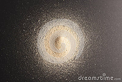 Close up of heap of sand and copy space on black background Stock Photo