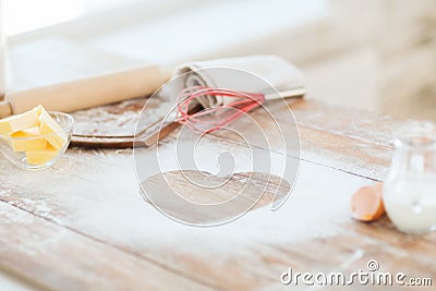 Close up of heart of flour on wooden table at home Stock Photo