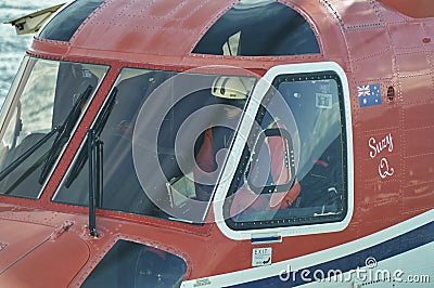 Close up of a Helicopter Pilot in the Cockpit having just landed on a Seismic Vessel in the North Sea. Editorial Stock Photo