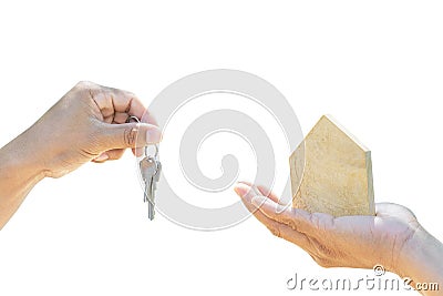 Holding house model and house key in hand.Mortgage loan approval home loan and insurance concept.on white background Stock Photo