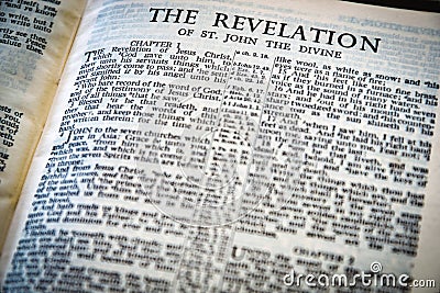 Close up of Holy Bible page, shallow depth of field with focus on book chapter, heading Stock Photo