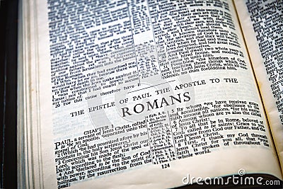 Close up of Holy Bible page, shallow depth of field with focus on book chapter, heading Stock Photo