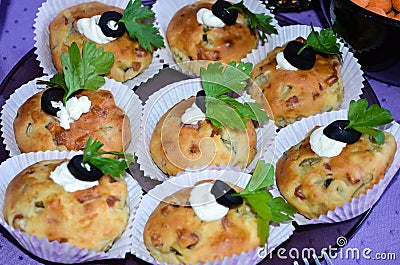 Close up of Home made cheese muffins with herbs and olives Stock Photo