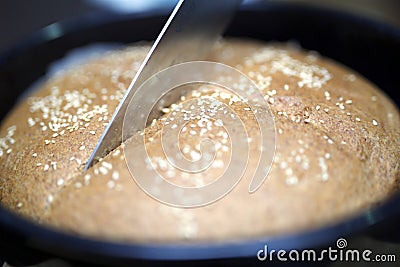 Integral bread in round casserole Stock Photo