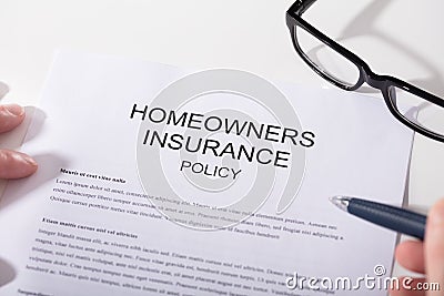 Close-up Of Homeowners Insurance Policy Form Stock Photo